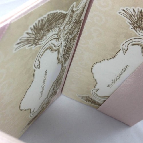 Blush pink silk envelope with modern invitation cards