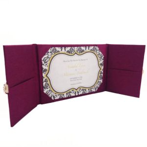 Opened dark magenta silk folder with pockets and two doors