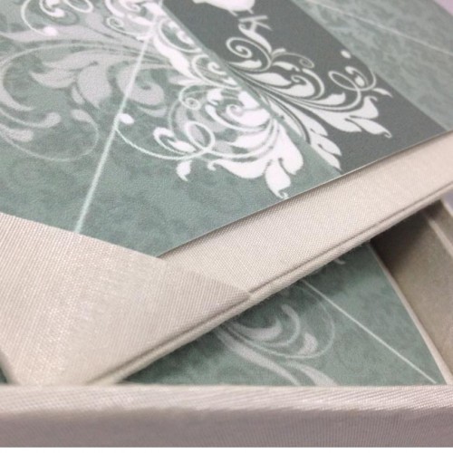 Detail view of silk corners inside a silk invitation box