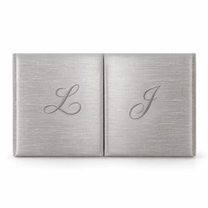 Luxury silver Thai raw silk gatefold wedding invitation folio with custom monogram embroidery, handmade in Chiang Mai, Thailand.