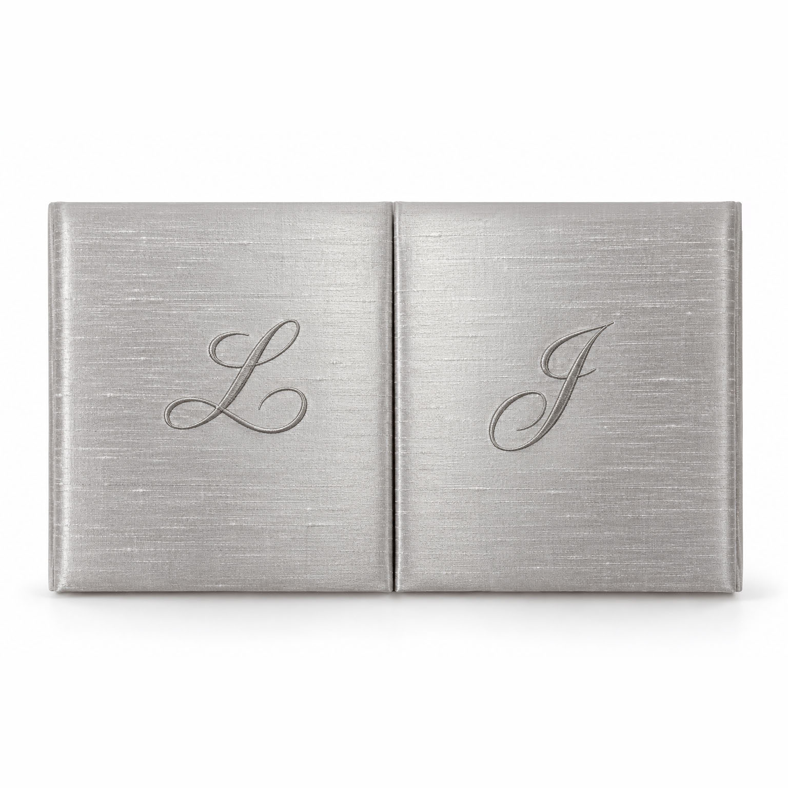 Luxury silver Thai raw silk gatefold wedding invitation folio with custom monogram embroidery, handmade in Chiang Mai, Thailand.