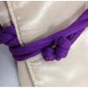 Knot view of the silk cord that locks the jewellery roll from opening