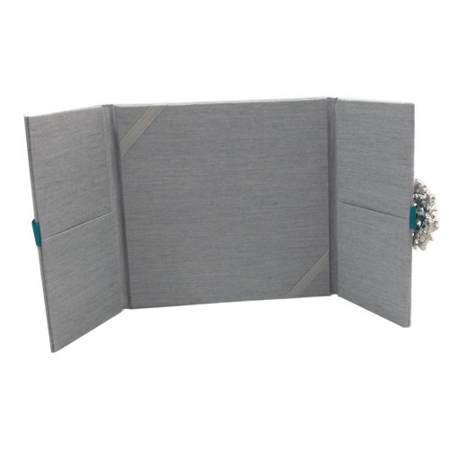 View of open silk folder from the inside with it's pockets and ribbon holder