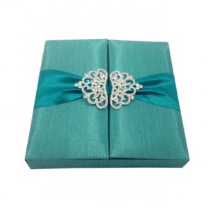 crown brooch embellished turquoise and teal color silk wedding invitation gate fold box