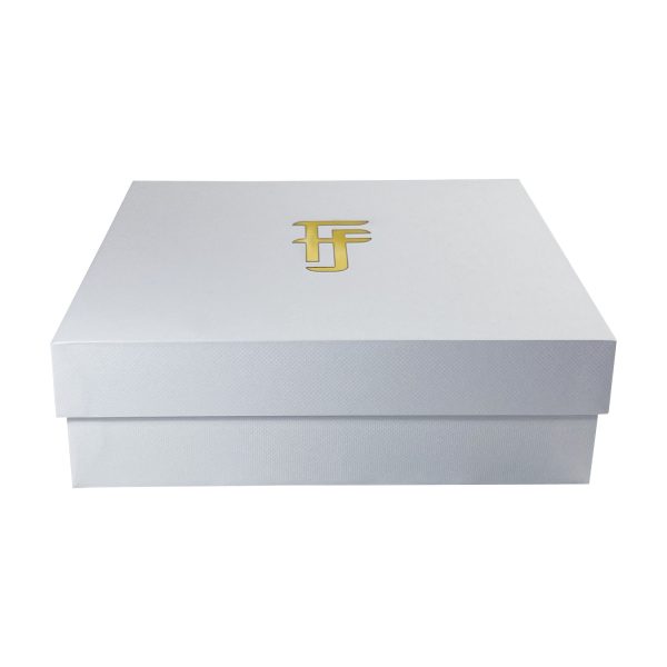 white box with gold foil logo