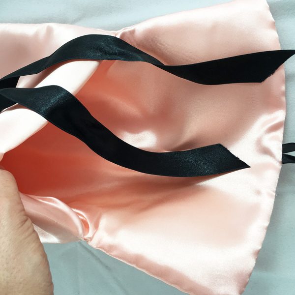 The inside of a satin lingerie bag