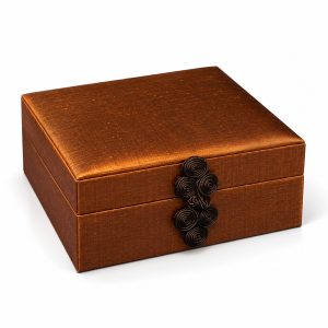Luxury dark olive green Thai silk gift box with traditional Oriental button closure