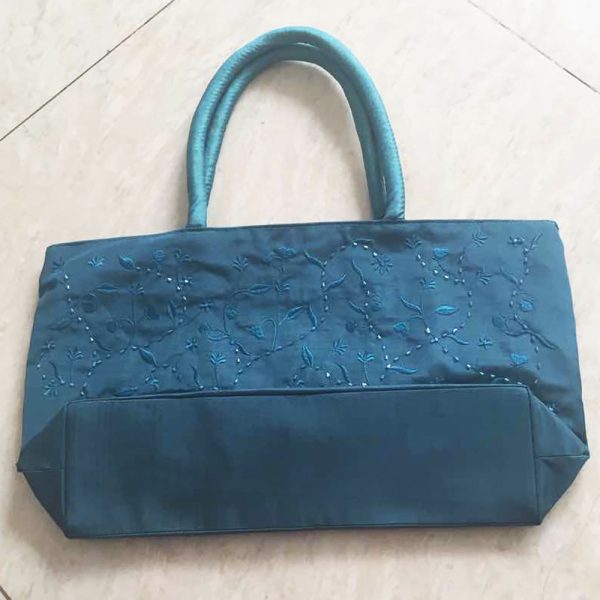 dark turquoise bag with embroidery