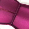 interior of magenta silk box