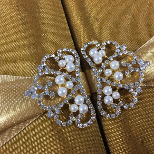 Pearl crown brooches