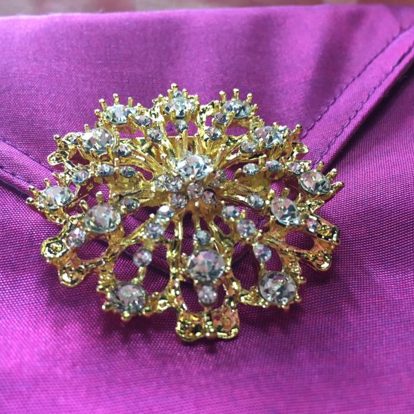 Golden wedding brooch
