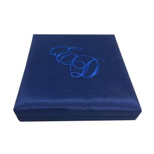 Royal blue silk wedding box with monogram embroidery
