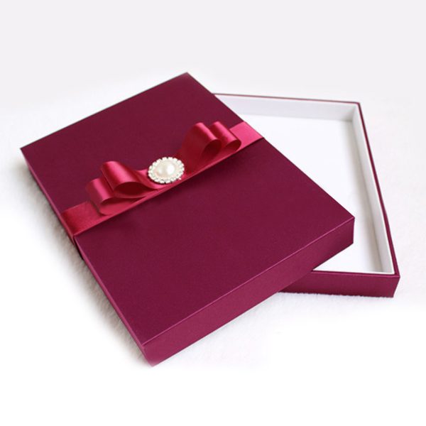 ruby silk wedding box with pearl brooch
