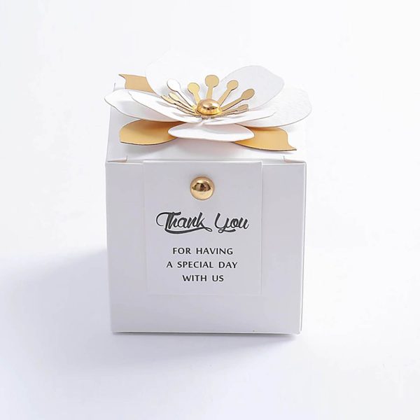 White wedding favor box with paper flower embellishment