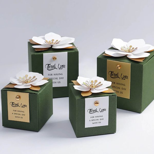 Green wedding favor box with paper flower embellishment