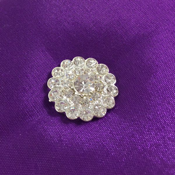 crystal button brooch