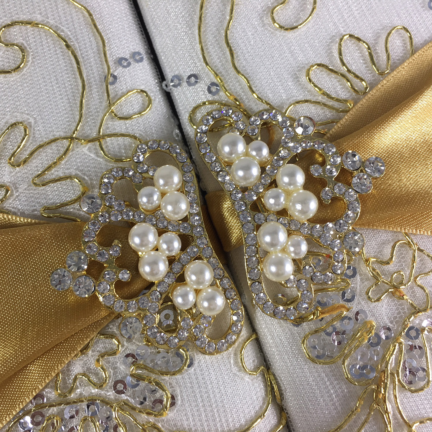 golden pearl pair brooch