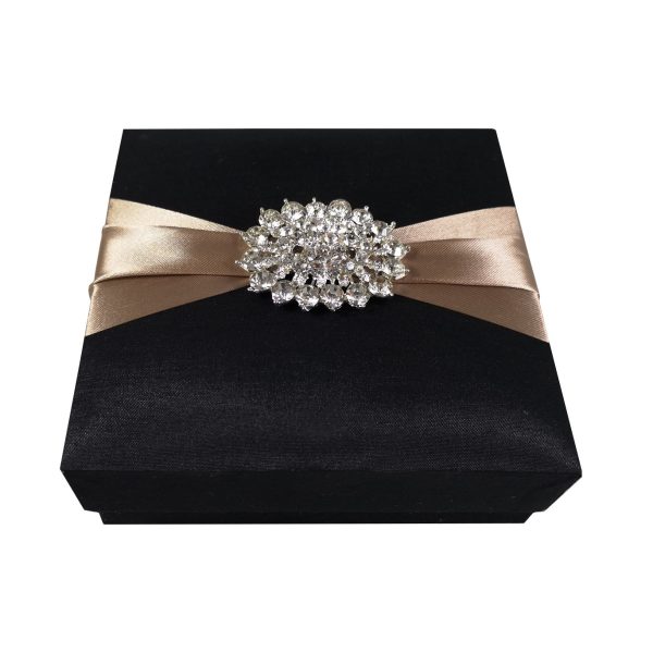 Black tray box with diamond brooch