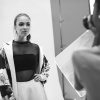 Photographer with model during photo shooting