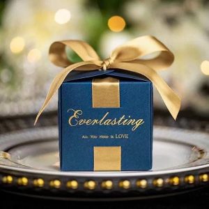 Blue wedding favor box with golden ribbon bow