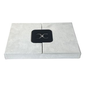 White custom made suede invitation box with acrylic monogram logo