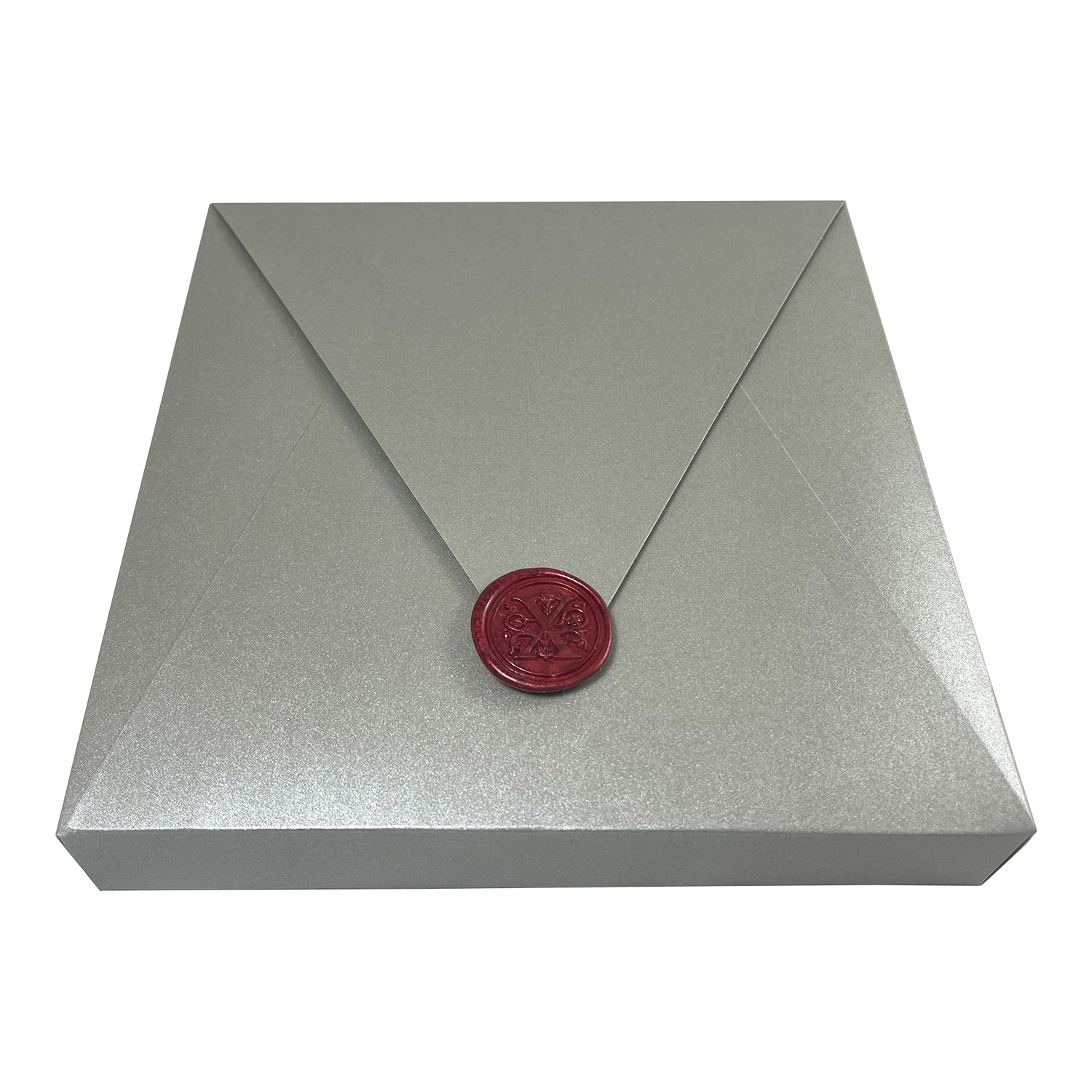 silver mailing envelope with wax seal