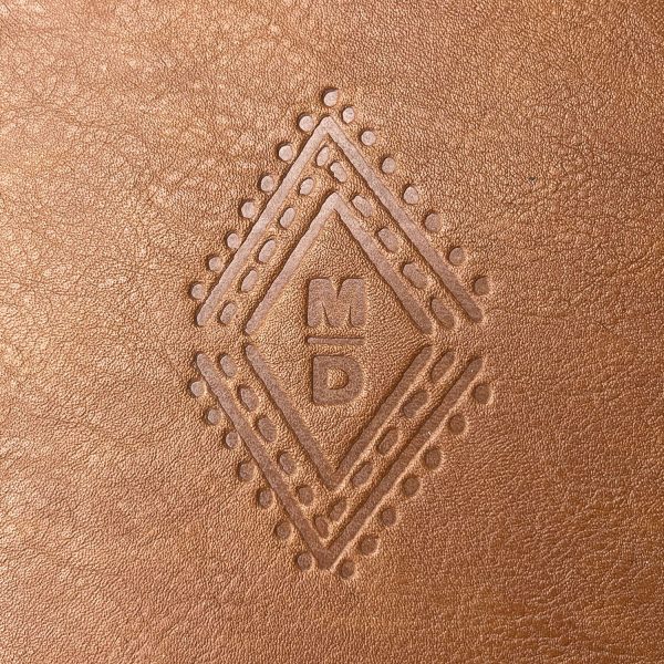 Hot stamped logo on leather