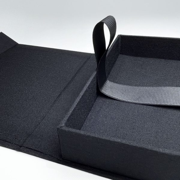 Close-up black linen photo box