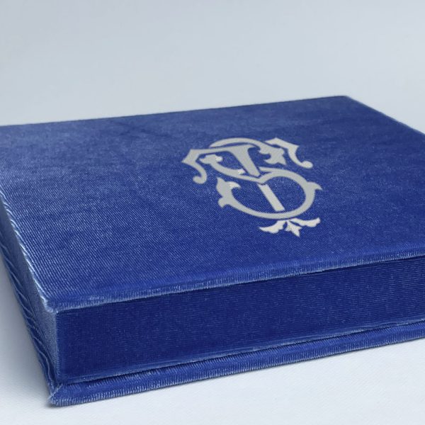 velvet invitation box with monogram embroidery