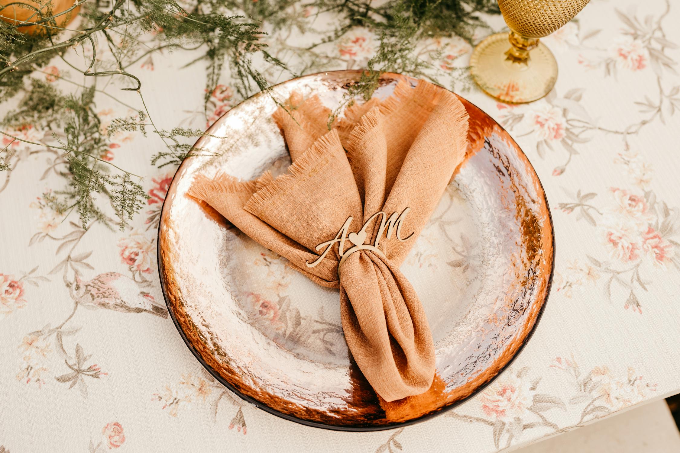 Elegant & sustainable wooden monogram napkin ring, custom laser cut designs from Dennis Wisser