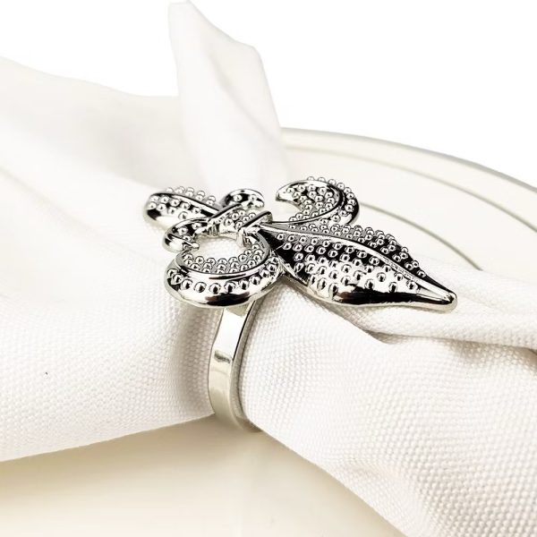 Silver fleur de lis ring for napkins