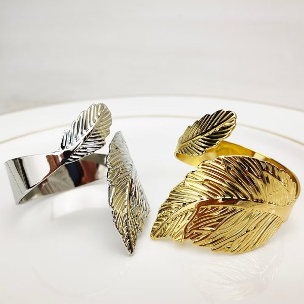 Gold and silver plated napkin ring, leaf motive