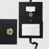 Top view of our handcrafted black velvet invitation box with matching mailing envelope