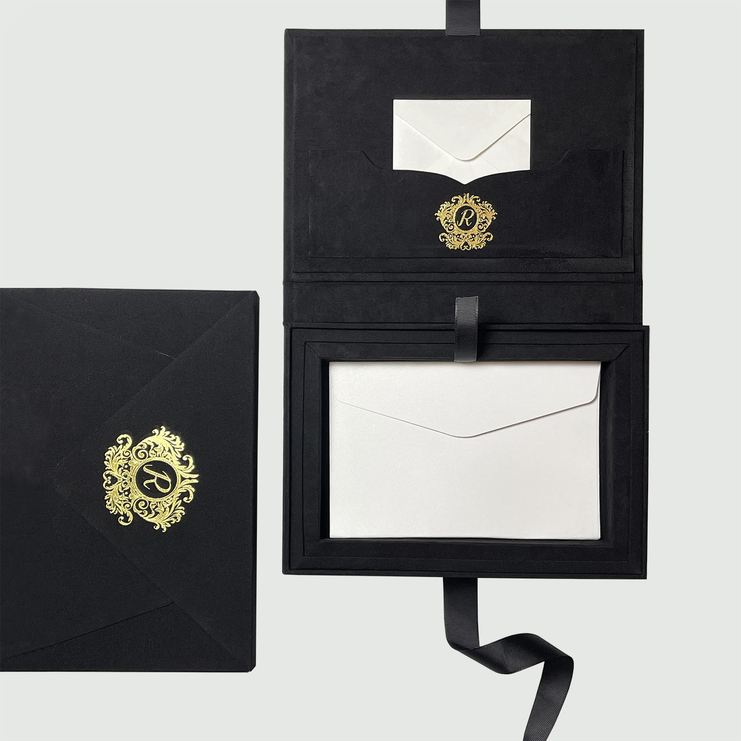 Top view of our handcrafted black velvet invitation box with matching mailing envelope